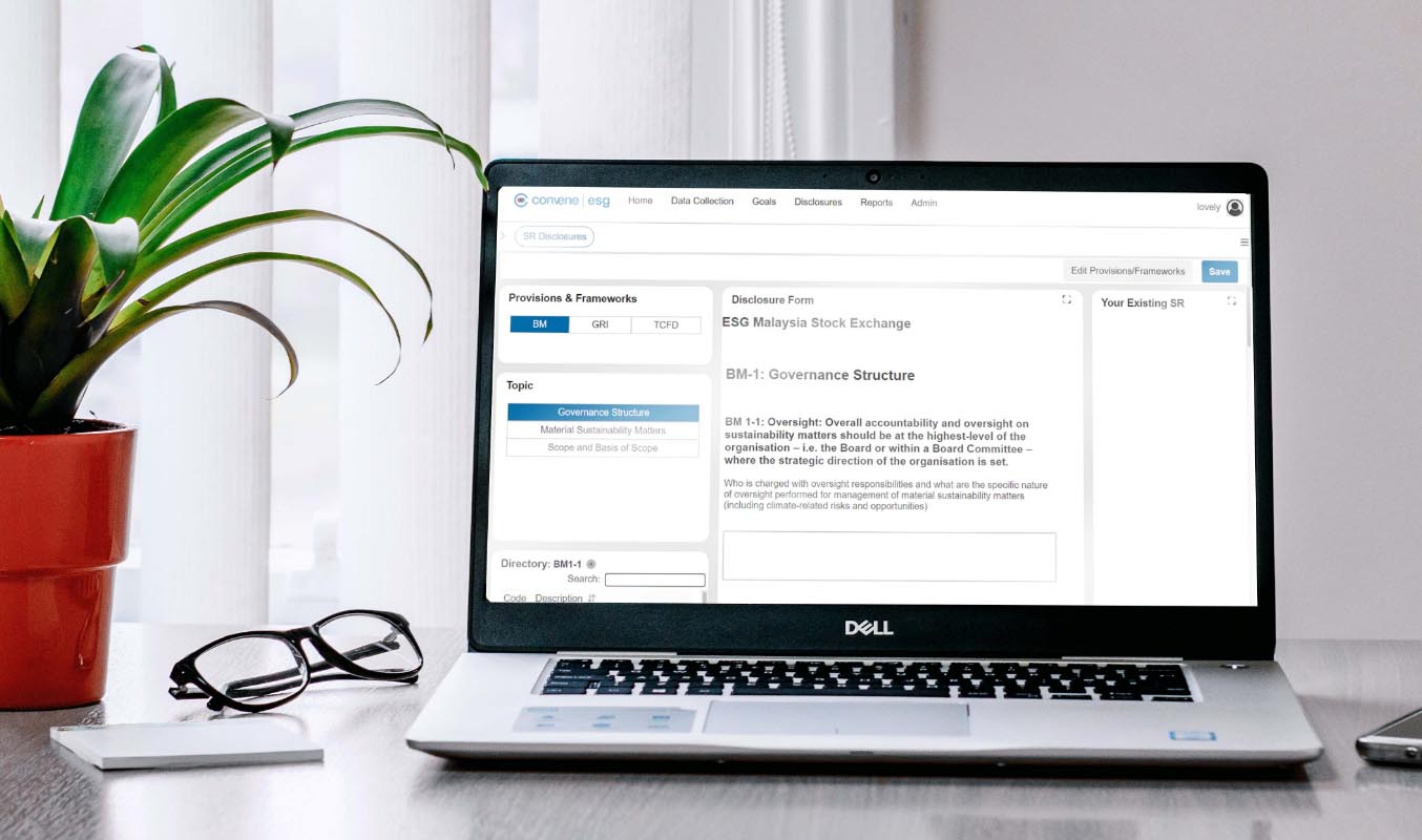Laptop screen showing how to create Bursa Malaysia compliant reports with Convene ESG