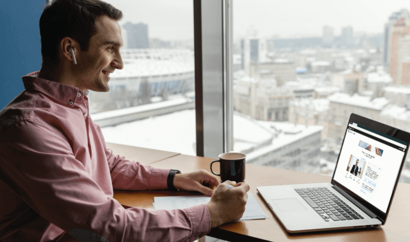 A male condo owner joining a virtual condo AGM through ConveneAGM on his laptop